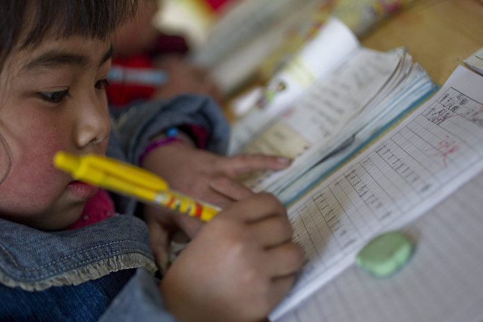 Cina chiede a genitori di non fare studiare troppo i figli