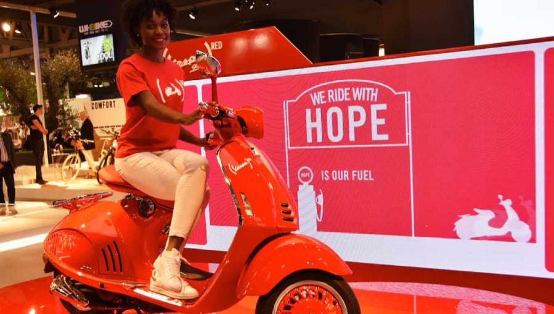 Red e Vespa uniti contro Aids e pandemie