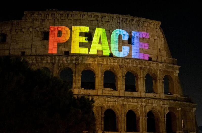 Projection of "Peace" on Colosseum in Rome